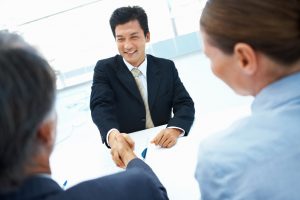 Business people shaking hands